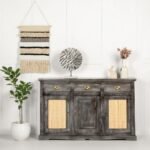 A slate grey finish solid sheesham wood sideboard featuring three top drawers and three doors revealing ample internal storage - Modera Furnish.