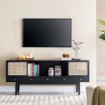 A black solid wood TV cabinet featuring two sliding cane doors and five integrated drawers with gold hardware - Modera Furnish.