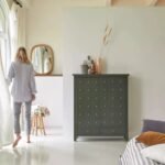 A grey duco finish solid wood cabinet featuring two doors with multiple knobs and two bottom storage drawers - Modera Furnish.