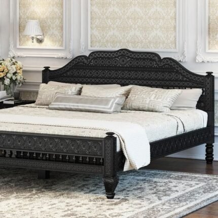 A majestic black solid rosewood bed featuring an intricately hand-carved mandala headboard and royal architectural details - Modera Furnish.