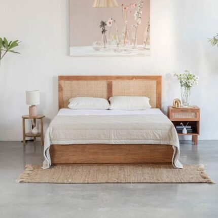 A natural solid wood storage bed featuring a hand-woven cane headboard and an effortless hydraulic lift system - Modera Furnish.