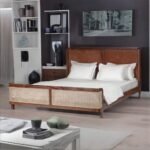 A dark walnut solid wood bed with a tan padded headboard and a hand-woven cane footboard - Modera Furnish.