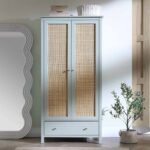 A mist grey double wardrobe featuring hand-woven rattan door panels and a single wide base drawer - Modera Furnish.