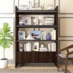 A dark brown engineered wood bookshelf featuring three open shelves and a two-door bottom storage cabinet - Modera Furnish.