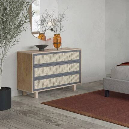 A natural mango wood chest of drawers with three wide storage drawers and curved side panels - Modera Furnish.