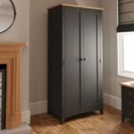 A gray solid wood wardrobe featuring two doors with a full-length hanging rail and a natural wood top - Modera Furnish.