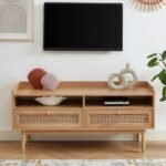A light oak solid wood TV cabinet featuring two cane-front drawers and gold-tipped tapered legs - Modera Furnish.