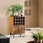 A natural solid mango wood wine cabinet featuring fifteen bottle cubbies and a single slatted storage door - Modera Furnish.