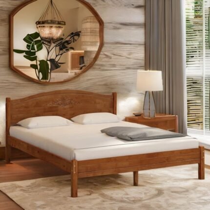 A honey finish solid wood double bed featuring an arched headboard with artisanal floral carvings - Modera Furnish.