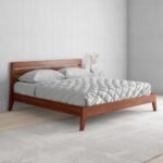 A sophisticated king-sized solid wood bed frame in mahogany finish featuring a rhythmic slatted headboard - Modera Furnish.