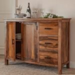 A glossy honey finish solid sheesham wood storage cabinet featuring three drawers and a double-door cupboard - Modera Furnish.