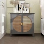 A light oak solid wood sideboard cabinet featuring circular cane door inlays and gold semi-circle handles - Modera Furnish.