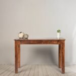 A sophisticated honey finish solid sheesham wood study desk featuring two storage drawers, a side cabinet, and artisanal geometric cut-outs - Modera Furnish.