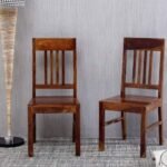 A dining chair set in walnut finish solid sheesham wood featuring a traditional vertical slat-back design - Modera Furnish.