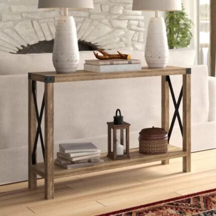 A 46-inch weathered brown wood console table featuring an open lower shelf, matte black metal X-bracing, and industrial corner hardware - Modera Furnish.