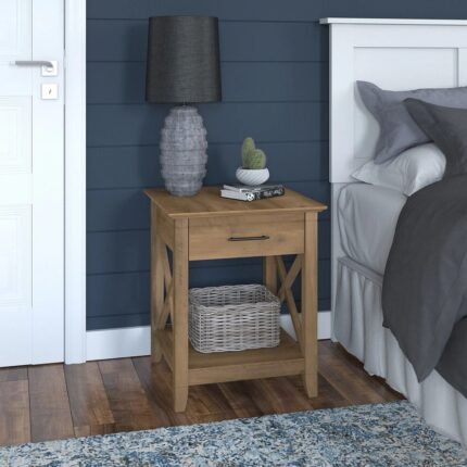 A natural light wood solid wood nightstand featuring a single drawer with a black handle and an open storage shelf - Modera Furnish.