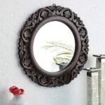 Hand-carved round wood wall mirror with matte brown floral frame for luxury vanities - Modera Furnish