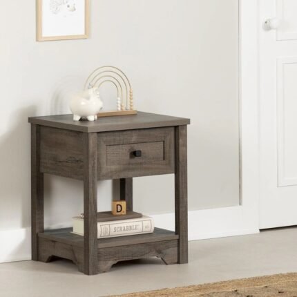 A brown solid wood bedside table featuring a single drawer with a silver knob and an open lower storage shelf - Modera Furnish.