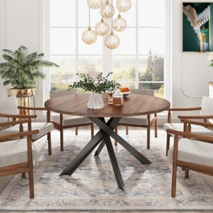 Round solid wood dining table with steel cross base in brown finish for modern dining interiors – Modera Furnish