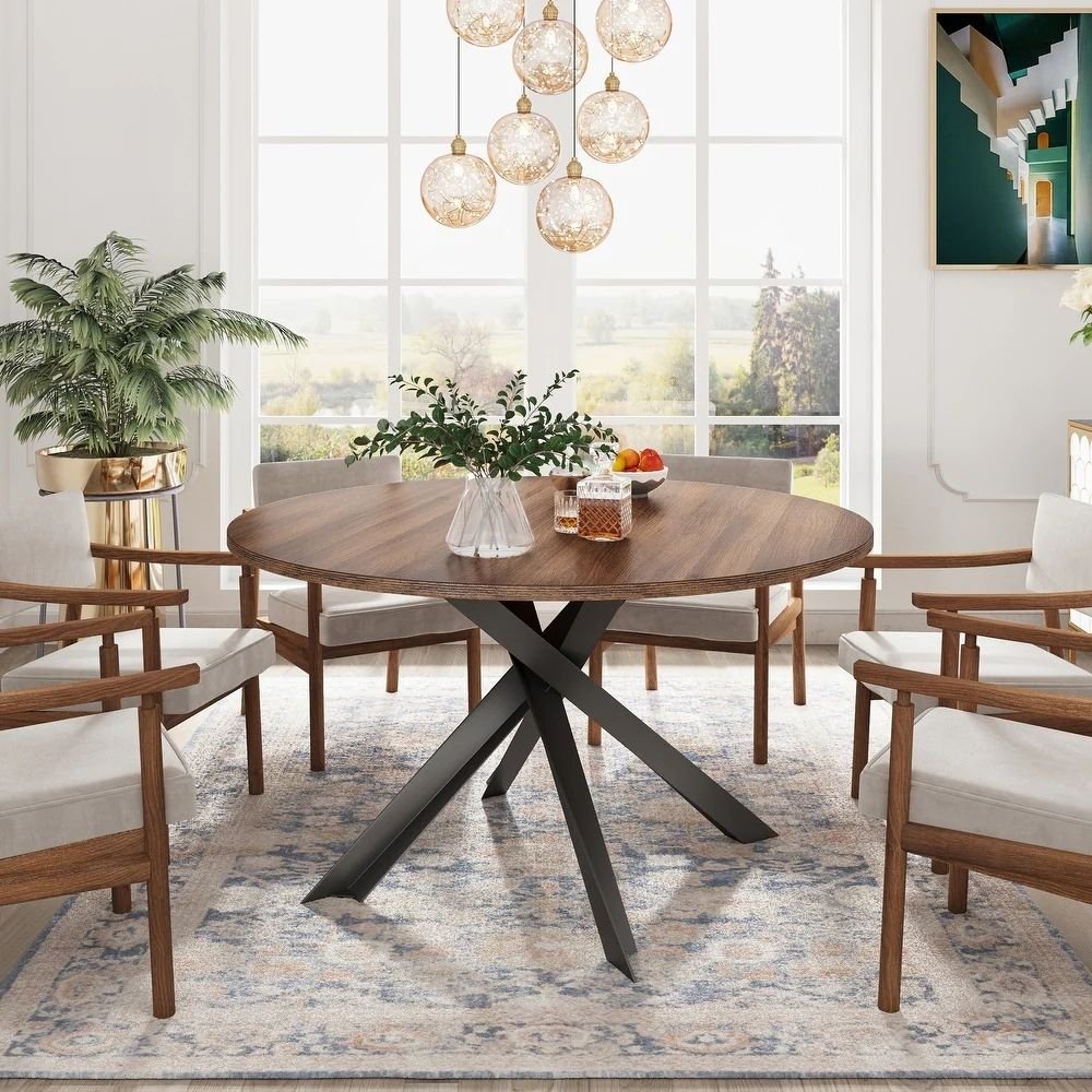 107 A brown modern solid wood round dining table features a sleek natural wood finish supported by a sturdy steel base - Modera Furnish.