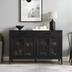 A bold black 56-inch solid wood sideboard console featuring two drawers and four poly-rattan mesh doors - Modera Furnish.