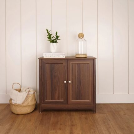 A rich brown 2 door solid wood sideboard cabinet featuring framed door panels and metallic knobs - Modera Furnish.