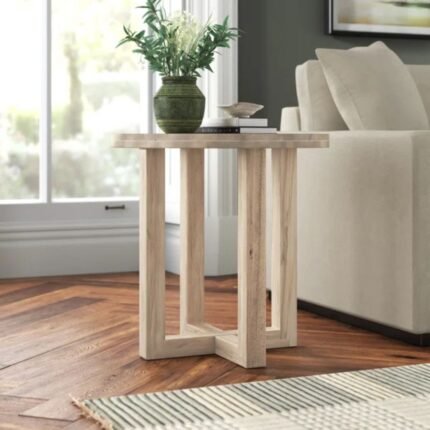 Minimalist round solid wood end table with cross-pedestal base in natural brown for luxury interiors - Modera Furnish
