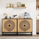 A large brown solid wood 4 door storage cabinet featuring intricate mandala carvings and a black industrial metal base - Modera Furnish.