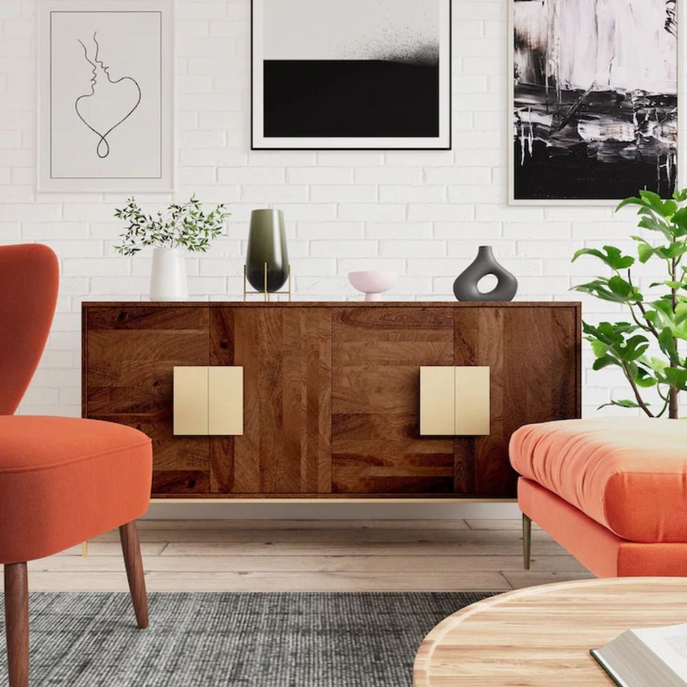 2 A grey solid wood sideboard featuring four doors with square brass pulls and an elevated gold metal base - Modera Furnish.