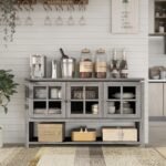 A grey 59-inch solid wood storage cabinet featuring four geometric glass doors and a walnut wood finish - Modera Furnish.