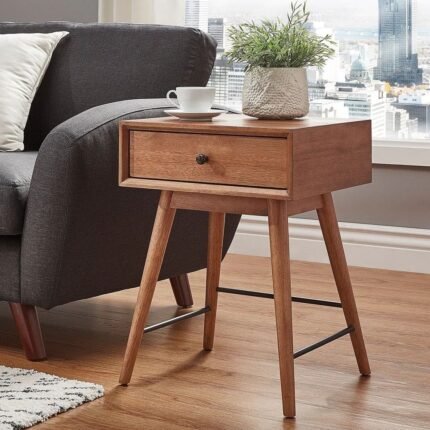 A mid-century modern 1-drawer wood end table in walnut brown with tapered legs and black metal cross-bracing - Modera Furnish