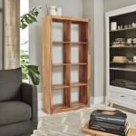 A warm brown solid wood bookcase with eight open storage cubes in a honey finish - Modera Furnish.