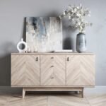 A beige 2 door 3 drawer solid wood sideboard with a chevron wood grain pattern and splayed legs - Modera Furnish.