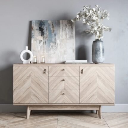 A beige 2 door 3 drawer solid wood sideboard with a chevron wood grain pattern and splayed legs - Modera Furnish.