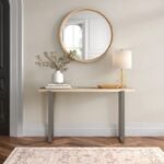 A rectangular brown solid wood console table with a minimalist gray metal frame base in a modern living room - Modera Furnish