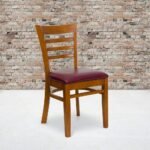 Modern solid wood ladder back dining chair with upholstered seat in black and burgundy finish for contemporary dining spaces - Modera Furnish
