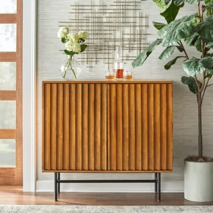 Exquisite mid-century solid wood bar cabinet with slatted doors, wine cubbies, and glass racks on metal base by Modera Furnish.