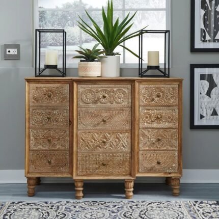 A brown solid wood accent cabinet featuring twelve drawers with unique hand-carved floral patterns and turned legs - Modera Furnish.