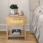 Solid wood bedside table with cane drawer detailing and open lower shelf in natural finish - Modera Furnish
