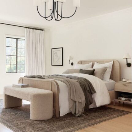 A natural pale oak solid acacia wood bed featuring curved headboard and footboard frames with hand-woven rattan inlays - Modera Furnish.