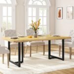 Sheesham wood modern dining table with oak finish and black metal base for contemporary interiors – Modera Furnish.