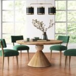 Solid wood round pedestal dining table in smoked honey finish with contemporary sculptural design - Modera Furnish