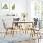 Modern solid wood dining table with white finish and natural wood legs in a minimal contemporary style – Modera Furnish