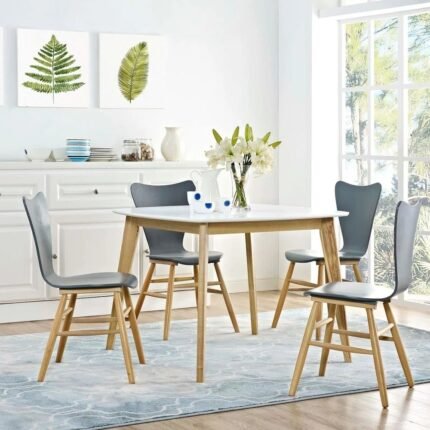 Modern solid wood dining table with white finish and natural wood legs in a minimal contemporary style – Modera Furnish